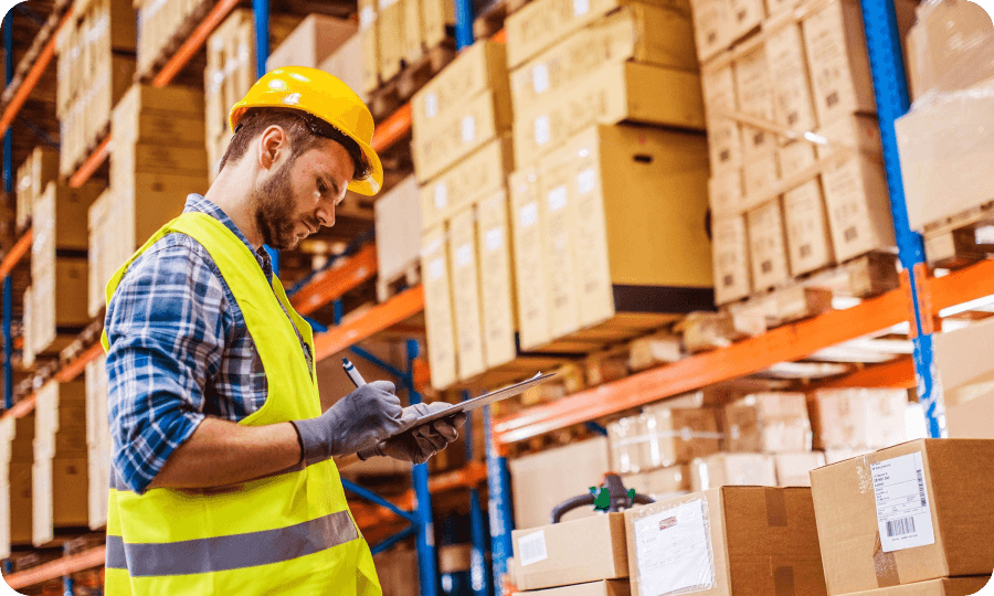 Warehouse worker checking inventory